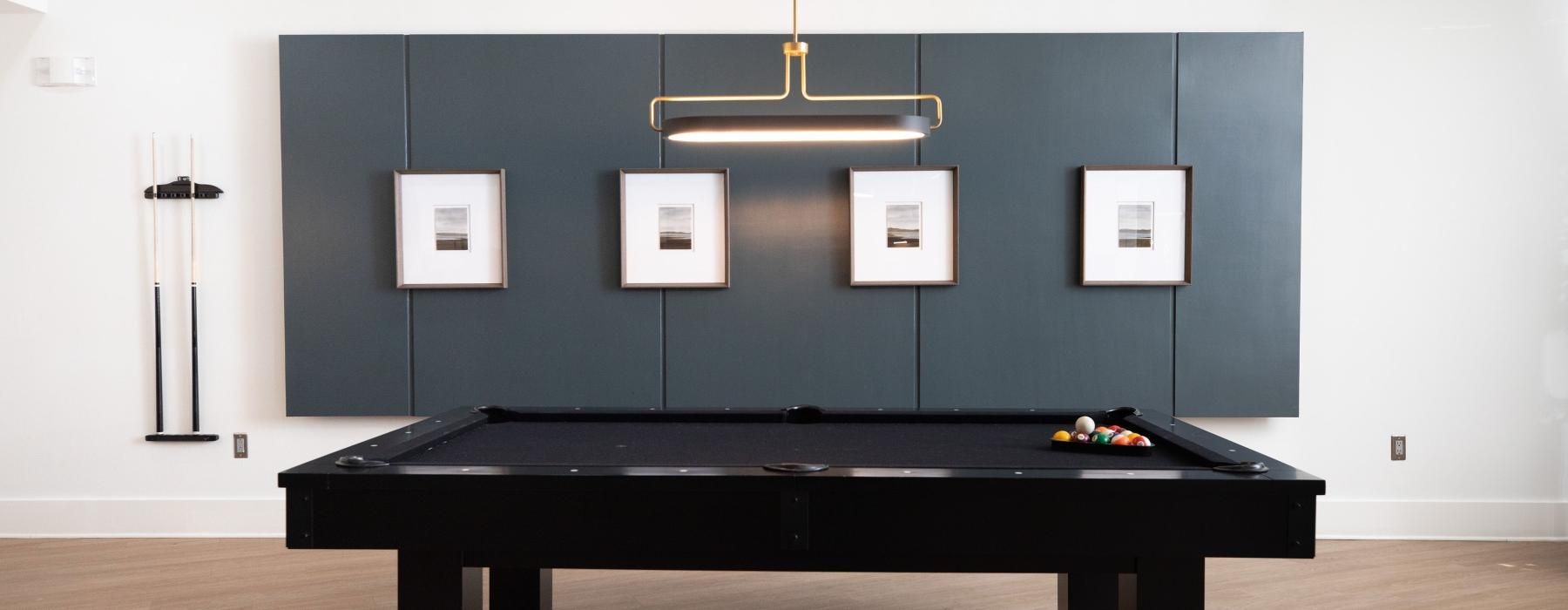 a black table with a black screen and white pictures on it