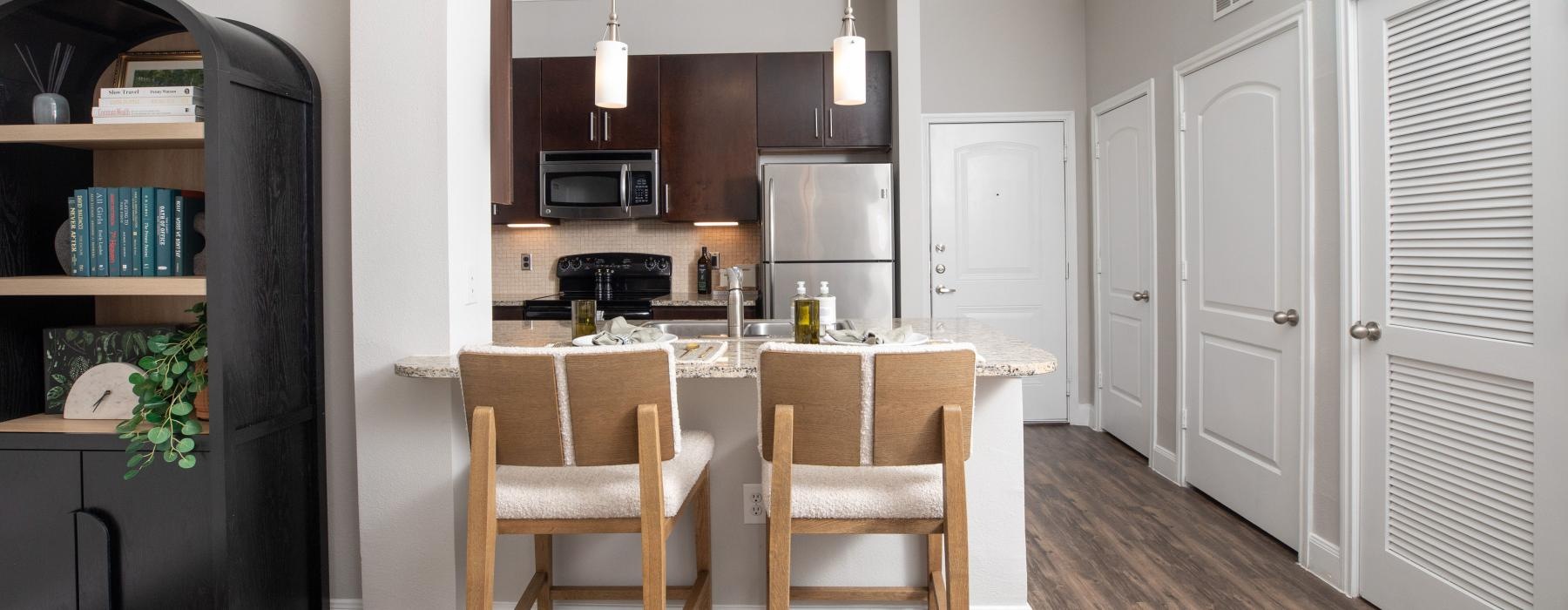 a kitchen with a dining table