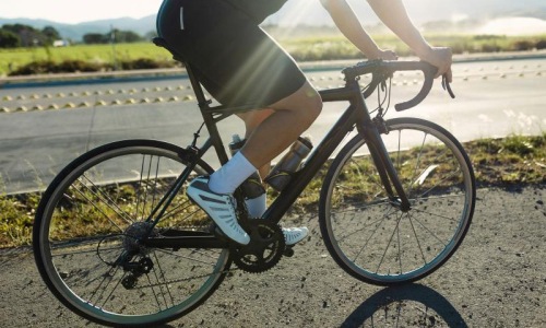 a person riding a bicycle outside